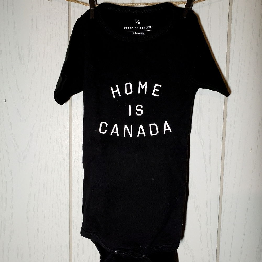 Like New Peace Collective "Home is Canada" onesie